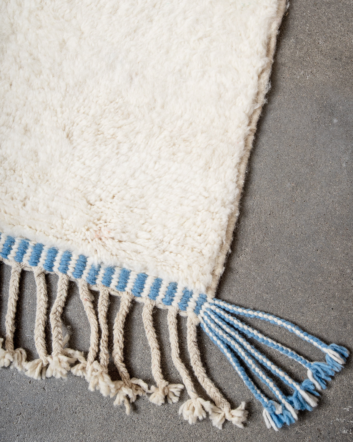 Modern, designer, handcrafted Berber rug from Morocco. Beniourain carpet with beautiful colours and patterns and fluffy wool texture.